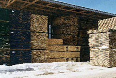 Stacked lumber is air dried before heading to the kiln.
