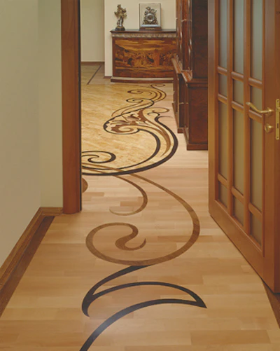 Finnish birch, Austrian pear, American walnut, jarrah and wenge combine for this 467square-foot floor that was cut without the use of lasers.