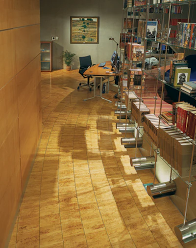 This modernistic library, from the same flat as the winning floor on page 30, includes Finnish birch separated by 'arch' strips of wenge. Eight employees worked for more than four months on the entire project.