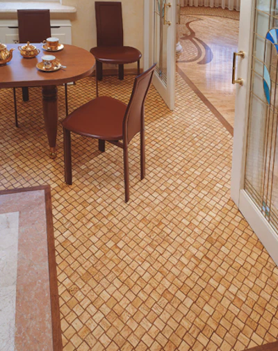 This tea room, another room from the flat that includes the winning project on page 31, features a design of American walnut and Finnish birch that results in a mat-like texture on the floor.