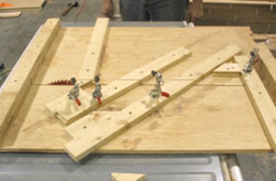 This custom-built jig, consisting of a plywood sled that glides across a saw table, is designed to cut all the pieces necessary for a French knot pattern.