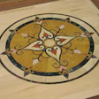 Beautiful stone medallions add an upscale element to a floor while being relatively easy to install.
