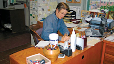 Smith works on collecting payments from homeowners.