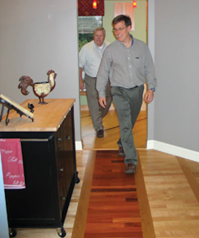 Schmidt’s upstairs showroom is filled with mock rooms showcasing his flooring offerings. Each room features a distinct decor and atmosphere.