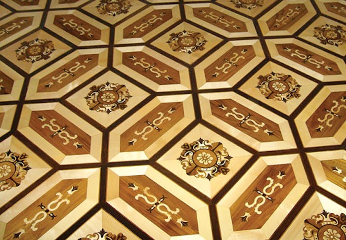 Maple, walnut, wenge and teak were included in this floor coated with waterborne finish.