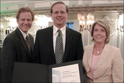 photo of John Ackiewicz receiving Climate Registry Award