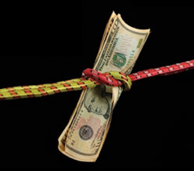 Photo of dollar stretched tight