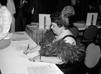 First National Wood Flooring Association employee Bonnie Holmes was in the spirit of the roaring '20s party at the Kansas City, Mo., convention, held April 27-30, 1988.