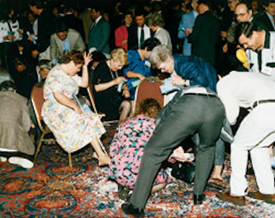 A scramble for 'Floorbucks' to be used in an auction for prizes was the highlight of the National Wood Flooring Association St. Louis convention in St. Louis.