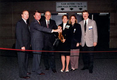 The opening ribbon is cut for the 1995 National Wood Flooring Association convention in Las Vegas.