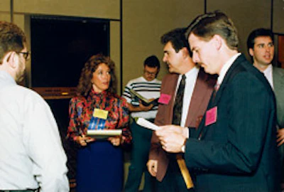 Jonny McSwain, seen at left during the seventh National Wood Flooring Association convention, held in Atlanta March 25-28, 1992, would become the first female president of the NWFA the following year.