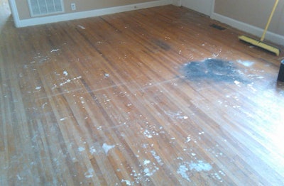 worn wood floor before sanding