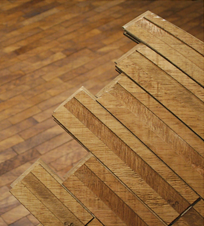'Curl' comprises three layers of plywood bender board glued together and bent using a custom form.