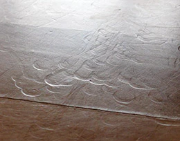 Dents, such as these from furniture legs, will not be hidden by recoating.
