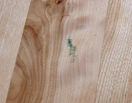 Mystery marks such as this green smudge are an unknown as to whether they will or won't come out.