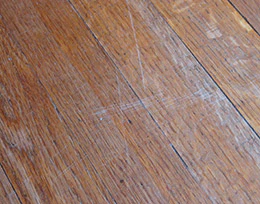 Areas where the floor looks gray and/or the finish appears to be worn off entirely indicate a floor that has to be resanded.