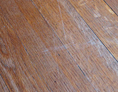 Areas where the floor looks gray and/or the finish appears to be worn off entirely indicate a floor that has to be resanded.