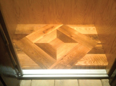 A Reclaimed White Oak Custom Built Wood Floor Medallion In A High End Florida Custom Home’s Elevator