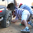 Flat tire in Peruvian jungle on GFTN trip