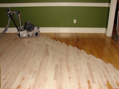Sanding a wood floor on a 45 degree angle.
