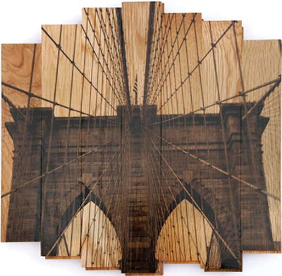 For their 'Wooden Postcards' series, artists Hugo Garcia Urrutia and MK Semos printed urban landscapes on reclaimed wood flooring.