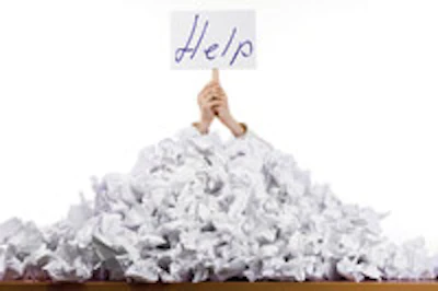 photo of a paper pile