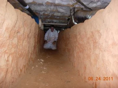 Craig De Witt In Crawl Space Ditch