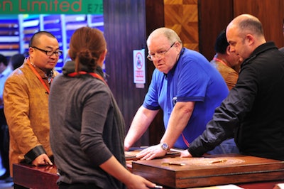 Flooring Exhibitors And Show Attendees Interact During Domotex Asia/China Floor 2011 In Shanghai, China