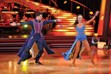 With Junckers Hardwood Inc. flooring underfoot, actor Ralph Macchio and professional dancer Karina Smirnoff dance the paso doble (above) and quickstep (below).