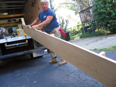 Gary's last order of business for the day is inspecting this 12-foot custom stair tread.