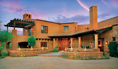photo of house with balcony overlooking foyer