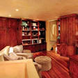 photo of living room with wood flooring and built-ins
