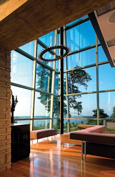 photo of bamboo flooring in a home with a lot of windows