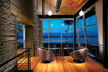 photo of bamboo flooring in a home with a lot of windows