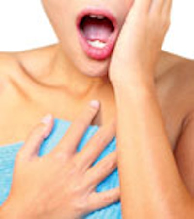 Photo of a woman wrapped in towel
