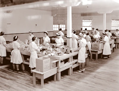 As WWII hit, the industrial maple floor industry was booming — here at the Red Dot Potato Chip plant in Madison, Wis., in 1939.