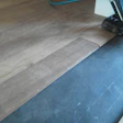 Thermotreated maple wood floor with Primatech nailer on wheels