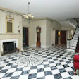 Faux finishes, like this marble-mimicking foyer in New York's Gracie Mansion, were a hallmark of early American design. (Photo courtesy The Alpha Workshops)