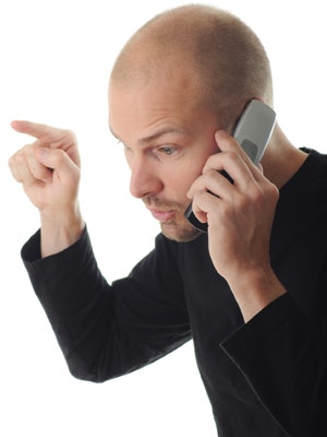 Photo of a mad guy on phone