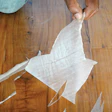 When this prefinished floor was recoated, the finish formed a nice, even film, and abrasion marks on the bottom of the peeling indicated plenty of abrasion, but this was one of those floors that simply could not be recoated. No pre-test for adhesion had been done before coating. (Photo courtesy of Bona US)