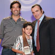 Avedis Duvenjian of Wood Floor of the Year Members' Choice winner Archetypal Imaginary Remodeling Corp. and his son Tigran with HGTV celebrity Carter Oosterhouse (left) at the 2012 NWFA Expo in Orlando, Fla., on April 12. (Photo courtesy David Stluka)
