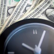photo of money and a clock