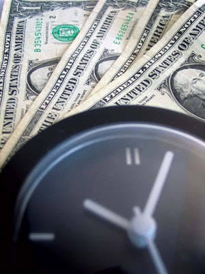 photo of money and a clock