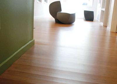 Great caution must be taken with strandwoven bamboo glued directly over a slab due to its tendency to cup in that situation. (Photos courtesy of Doug Foucault, Hefeng USA/ECOfusion Flooring)