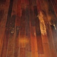 photo of wood floor with blister problem