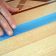photo of taping edge of finish line