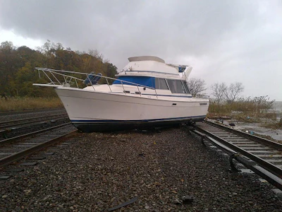 A boat rests on railroad tracks near the New York Metropolitan Transportation Authority's Ossining station. Photo courtesy of MTA.
