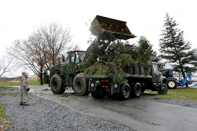 Fallen trees killed several as Hurricane Sandy pummeled the East Coast. Here, members of the Pennsylvania National Guard clean up debris near Fort Indiantown Gap, Penn. Photo courtesy of Pennsylvania National Guard.