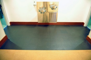 (AFTER) After image showing repaired flooring underneath water fountain