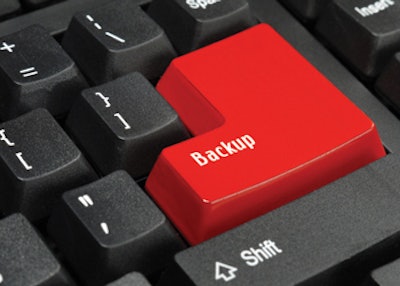 photo of keyboard with large red backup button